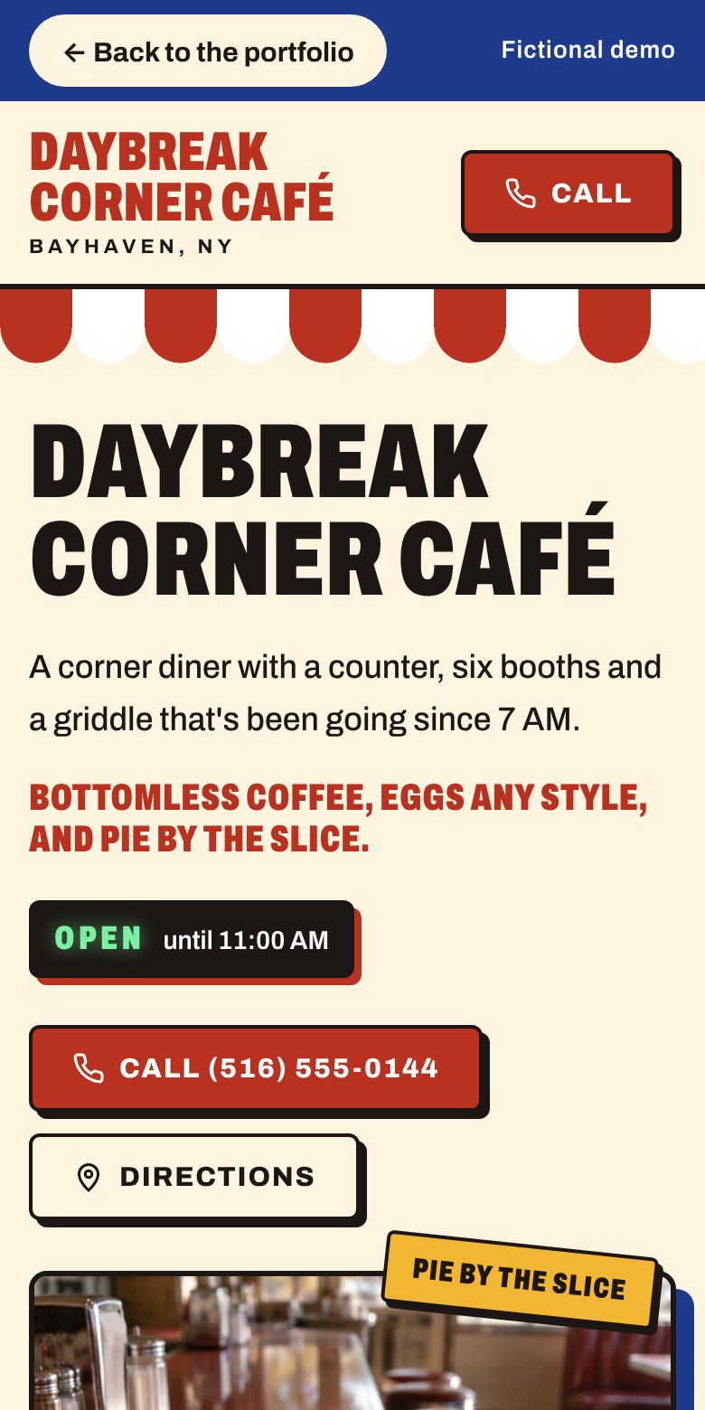 Daybreak Corner Café demo site on a phone: striped awning, big diner name, open-now sign and call button